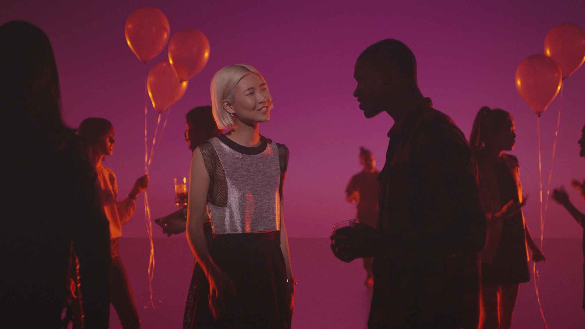 The matching party scene after adaptation, with the upper-arm tattoo removed.
